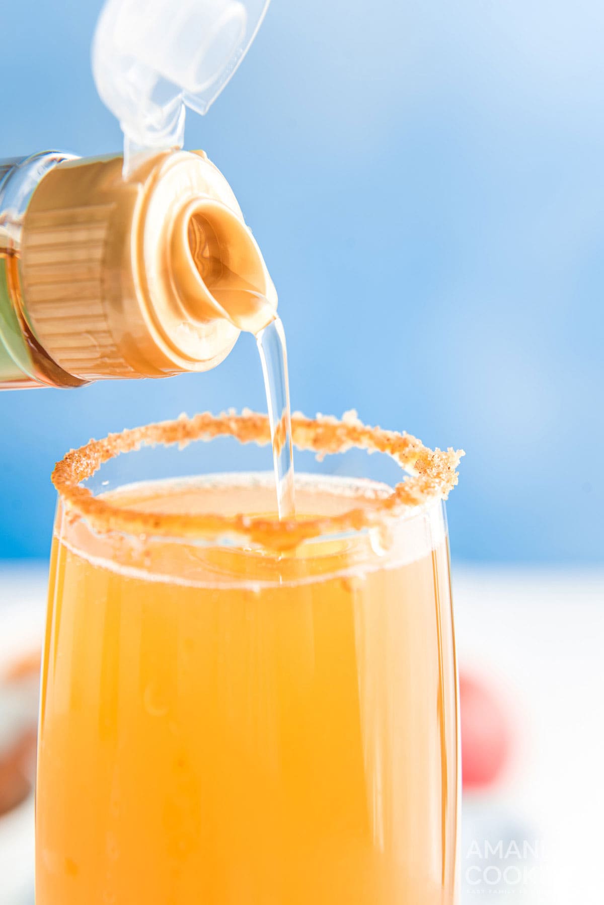 adding syrup to glass