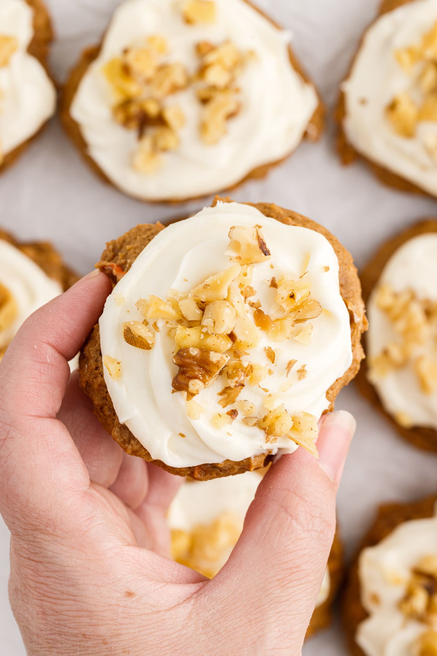 Hand holding a Carrot Cake Mix Cookie