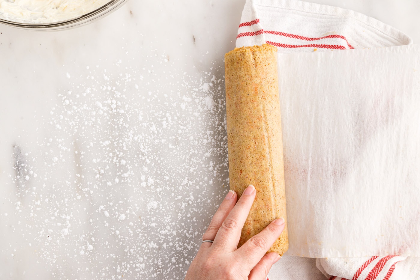 unrolling carrot cake roll