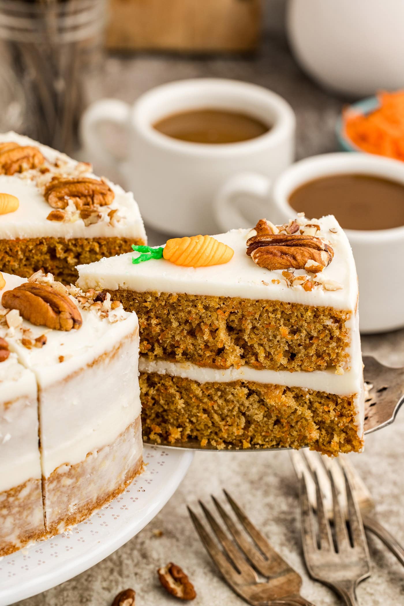 Slice of Carrot Cake being removed from the cake