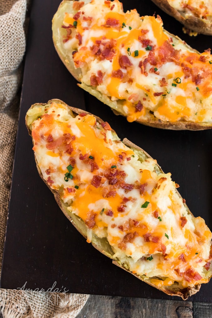 overhead photo of twice baked potatoes on a cookie sheet