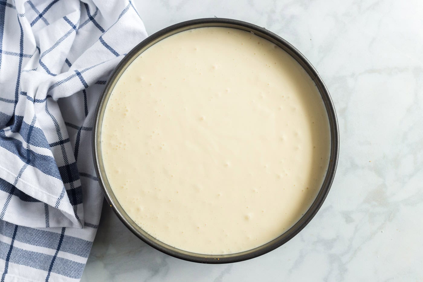 cheesecake mixture in pan
