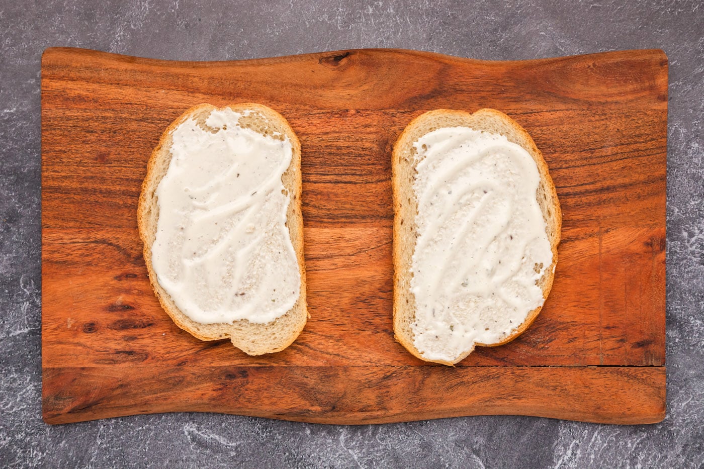 ranch dressing spread on rye bread slices