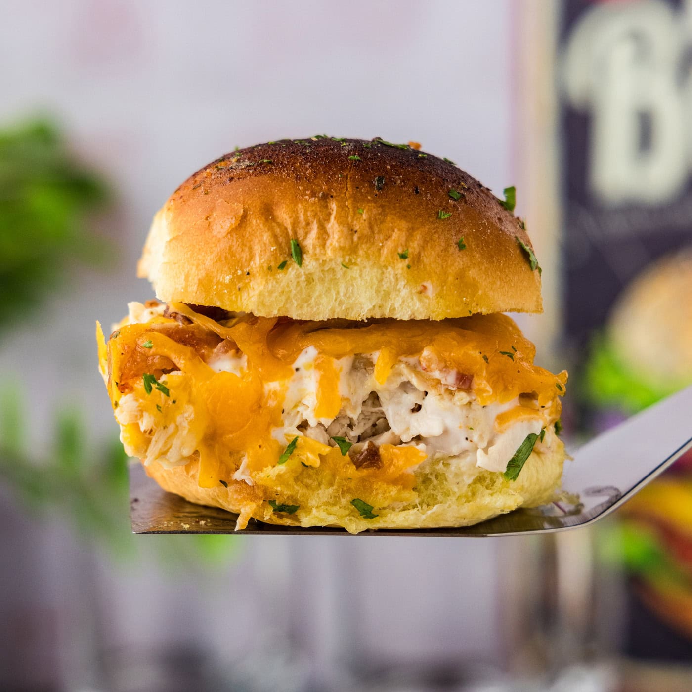 Close up photo of a Chicken Bacon Ranch Slider on a spatula