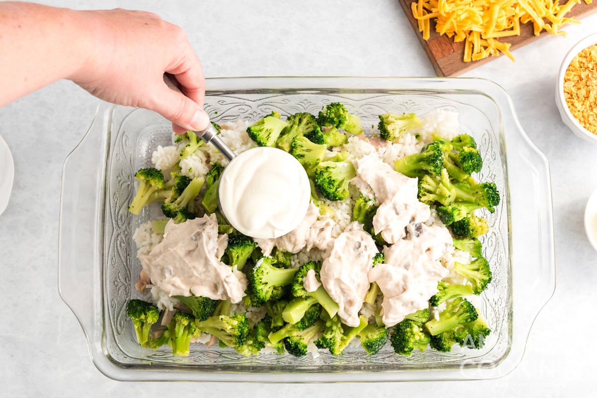 adding sour cream to pan with other ingredients