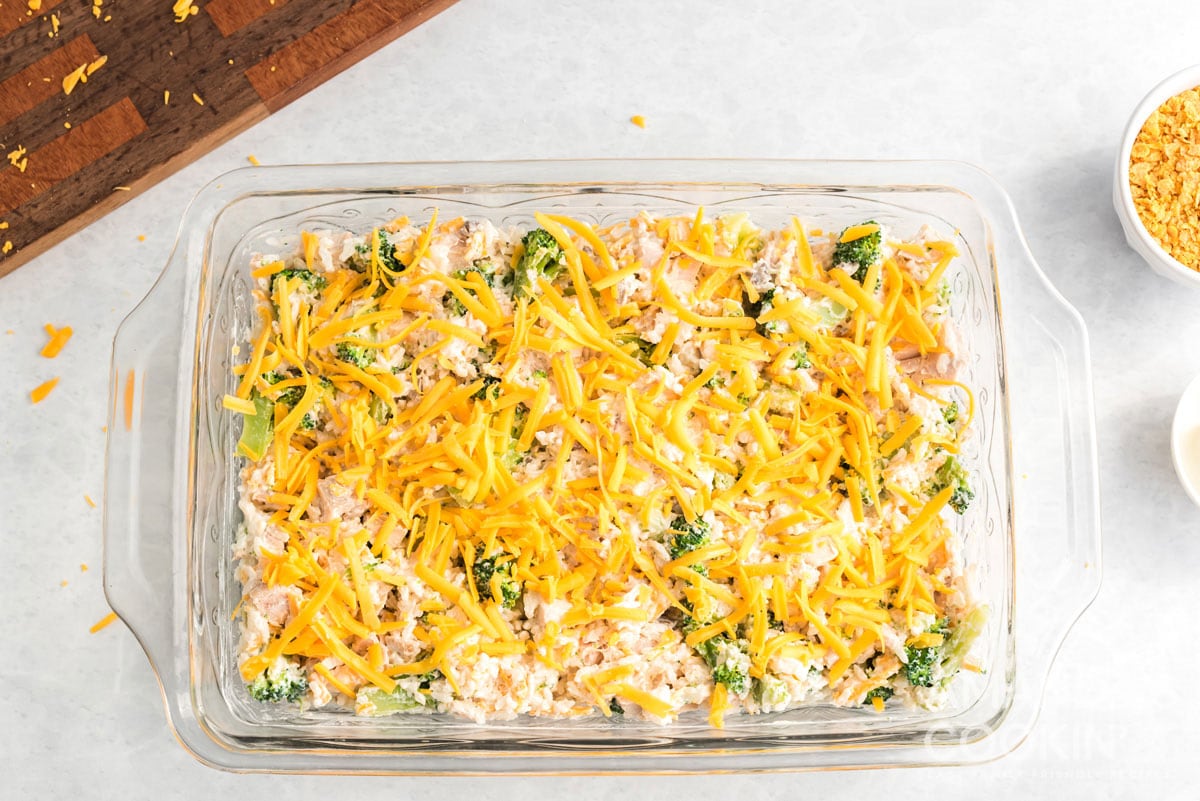 grated cheddar cheese on top of casserole