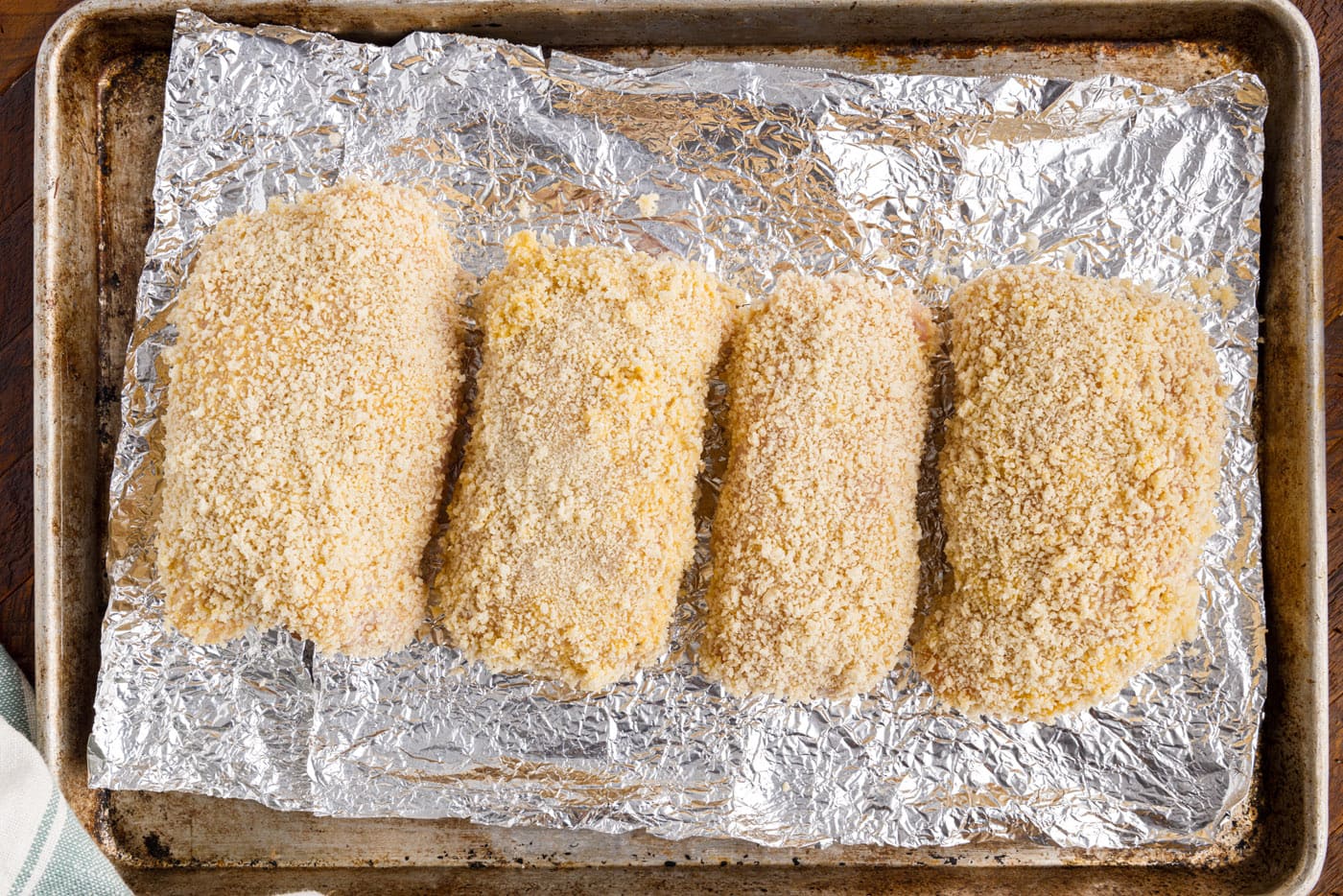 chicken cordon bleu on baking sheet