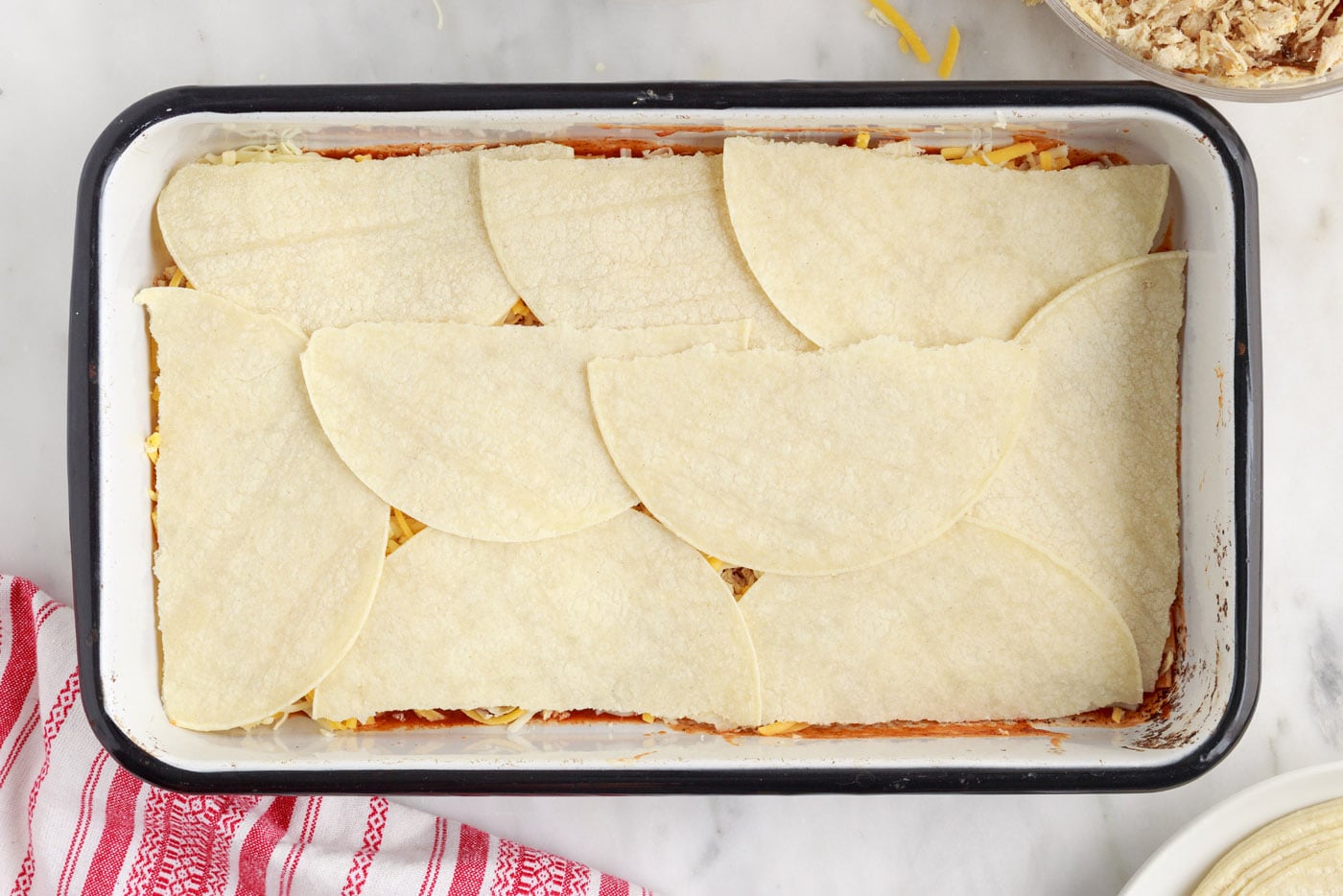 layer of tortillas on enchilada casserole