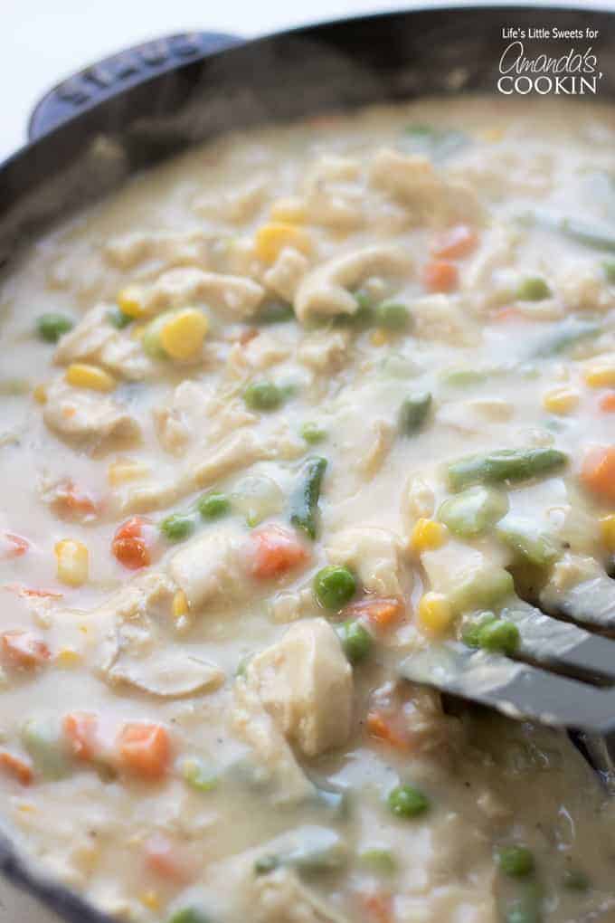 Chicken Pot Pie Tater Tot Casserole cooking on the stovetop