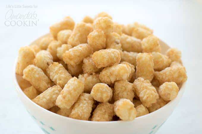 Tater tots for Chicken Pot Pie Tater Tot Casserole in a bowl