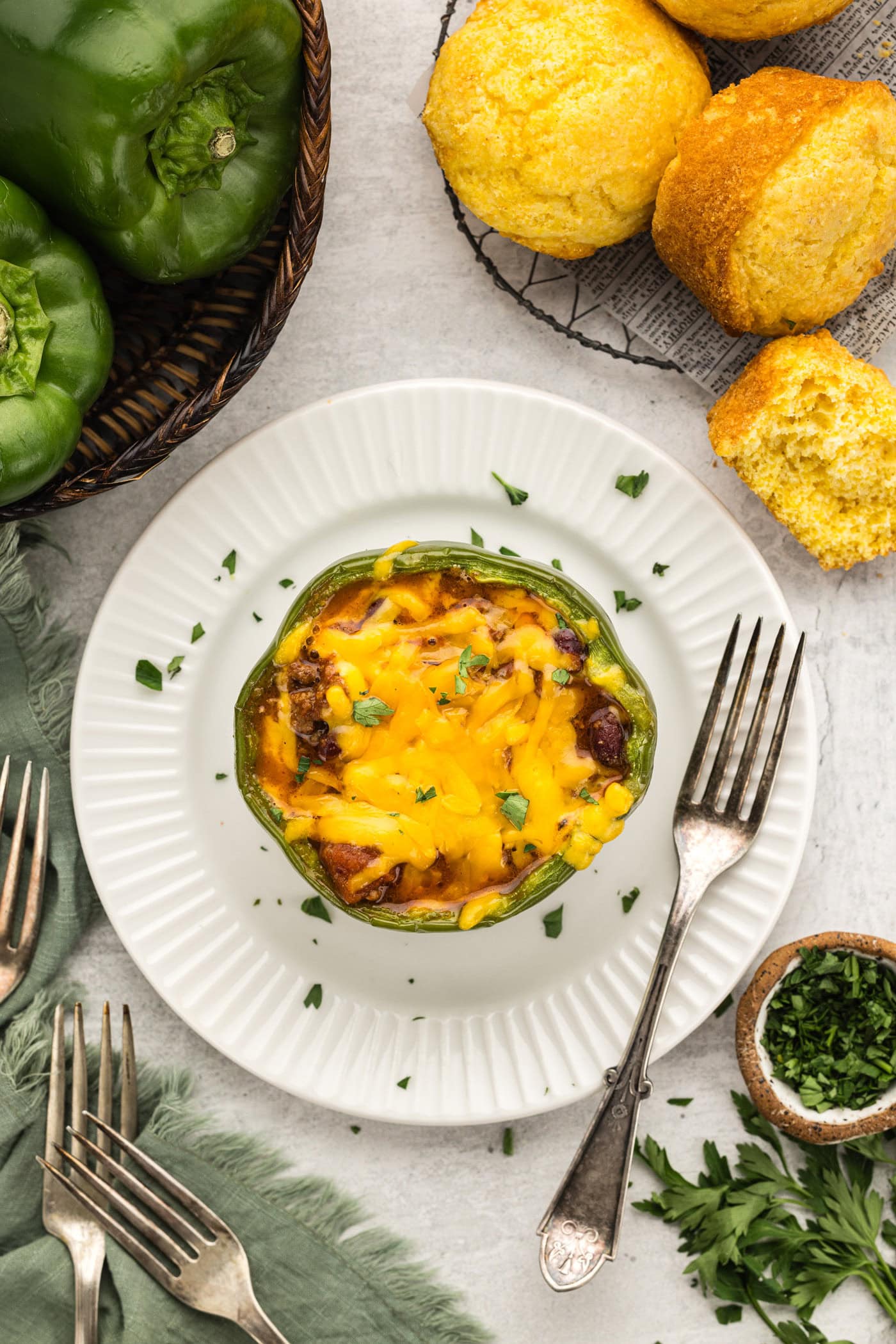 Oerhead photo of a Chili and Cornbread Stuffed Pepper on a plate