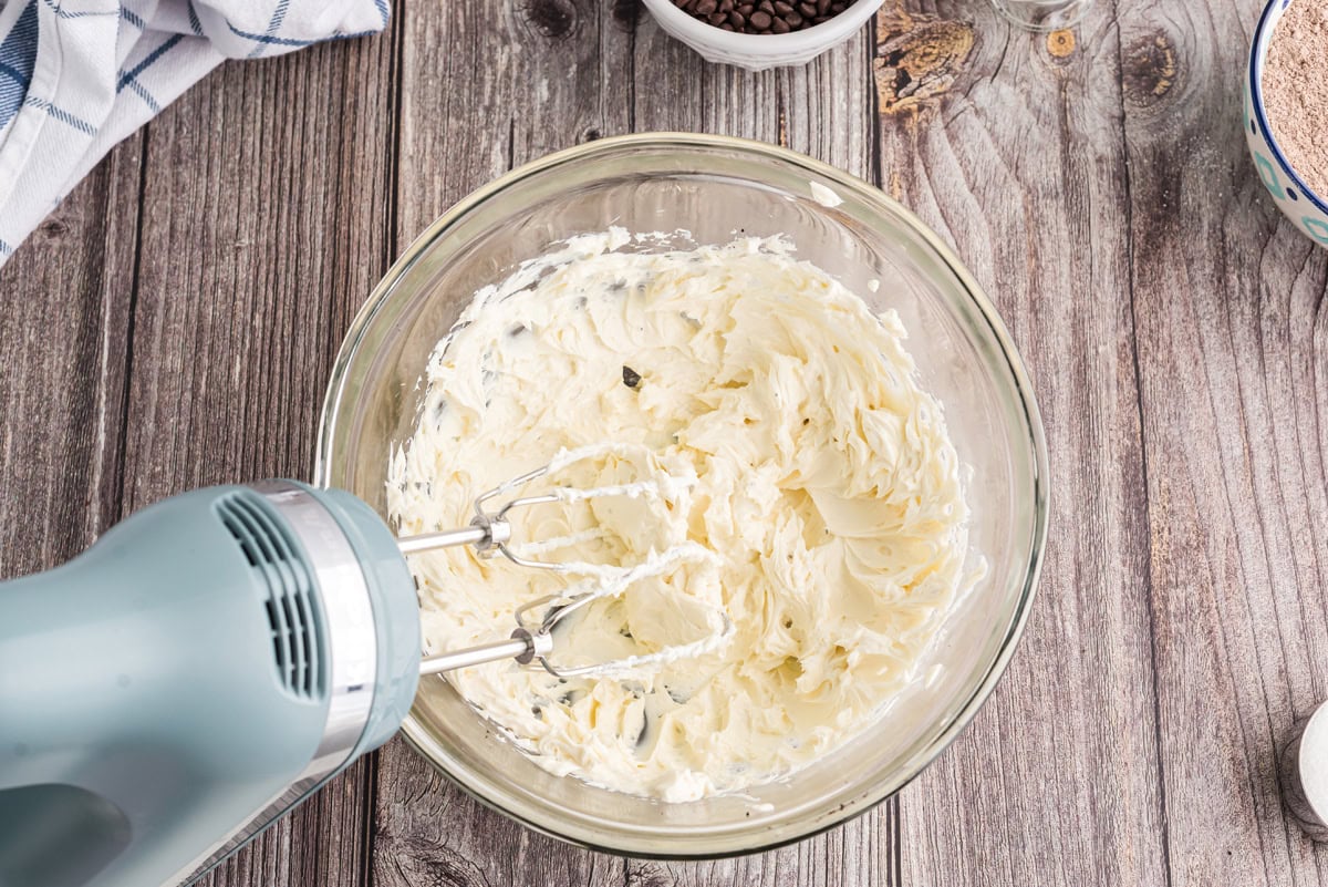 Beaten cream cheese in a mixing bowl