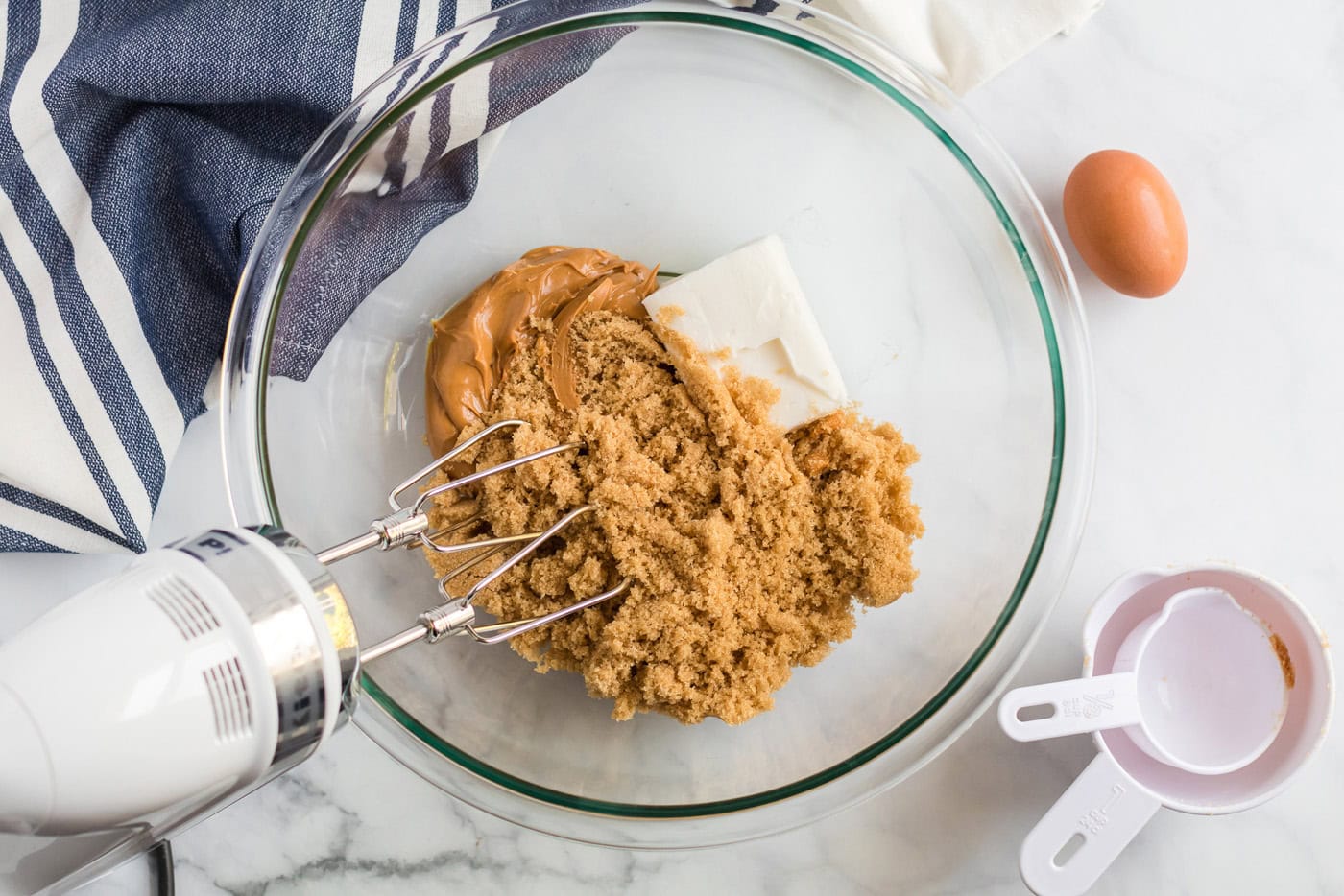 Shortening, peanut butter, brown sugar, milk and vanilla in a mixing bowl