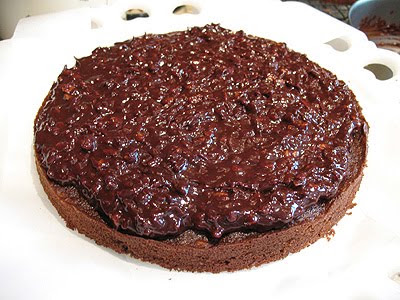 A photo of half of the filling spread onto one cake layer.