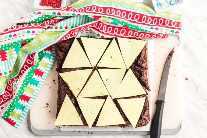 brownie pan with paper triangles on top