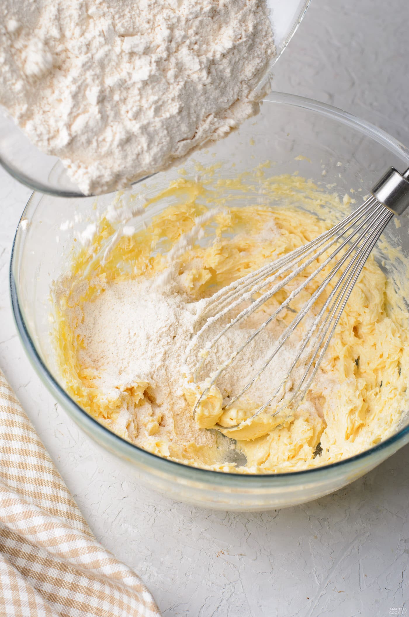adding dry ingredients to wet ingredients