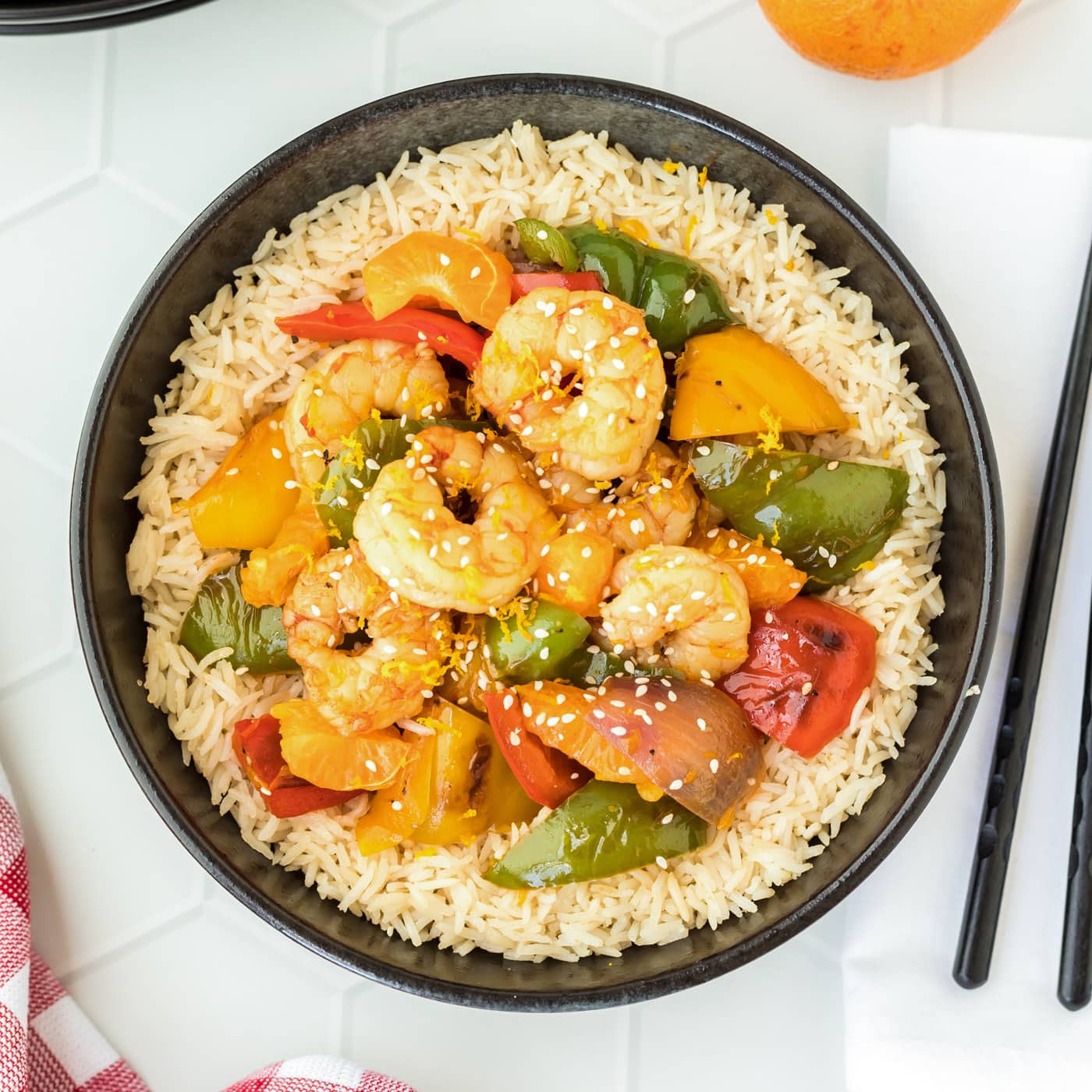 Citrus Pepper Shrimp in a bowl with chopsticks