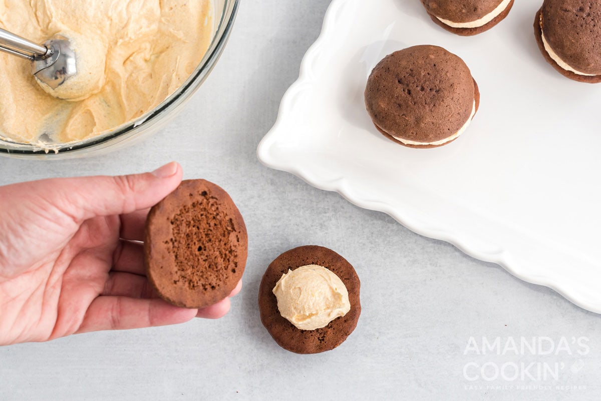 putting top on whoopie pie