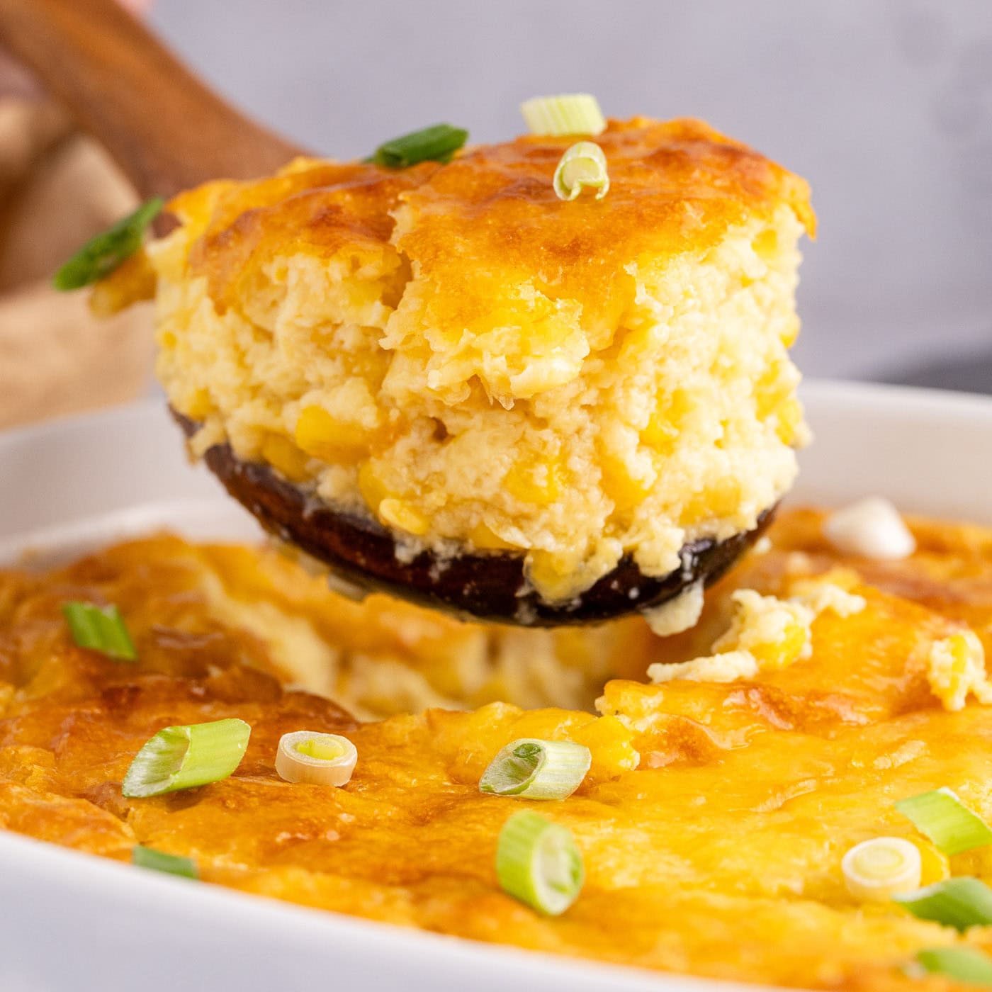Close up photo of a scoop of Corn Pudding