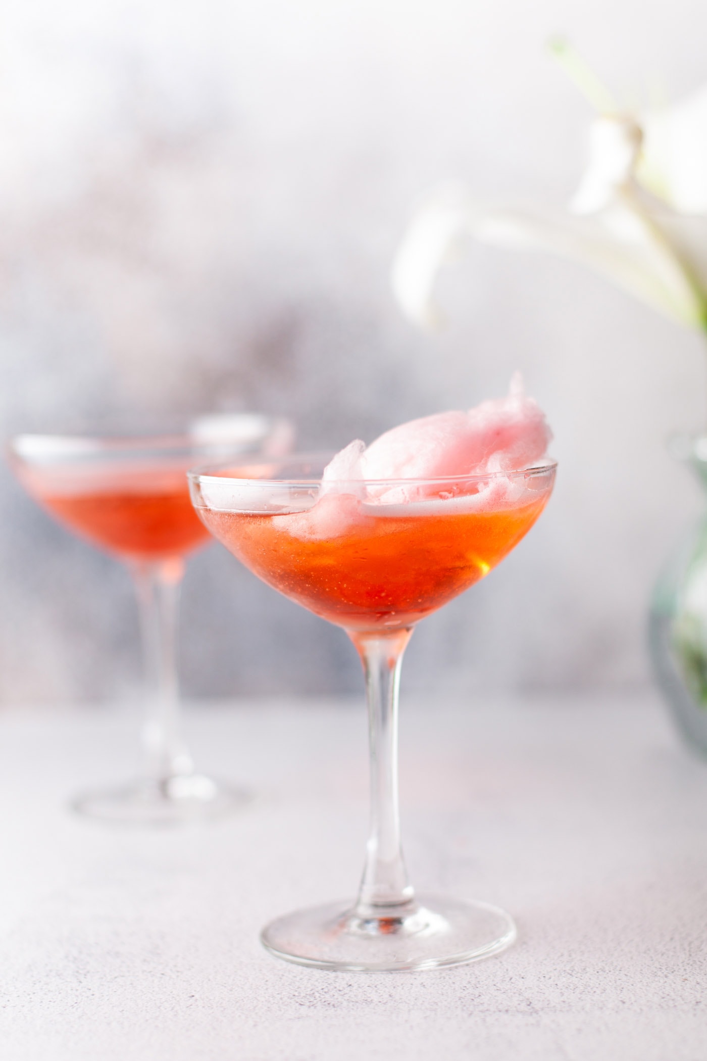cotton candy champagne in a martini glass