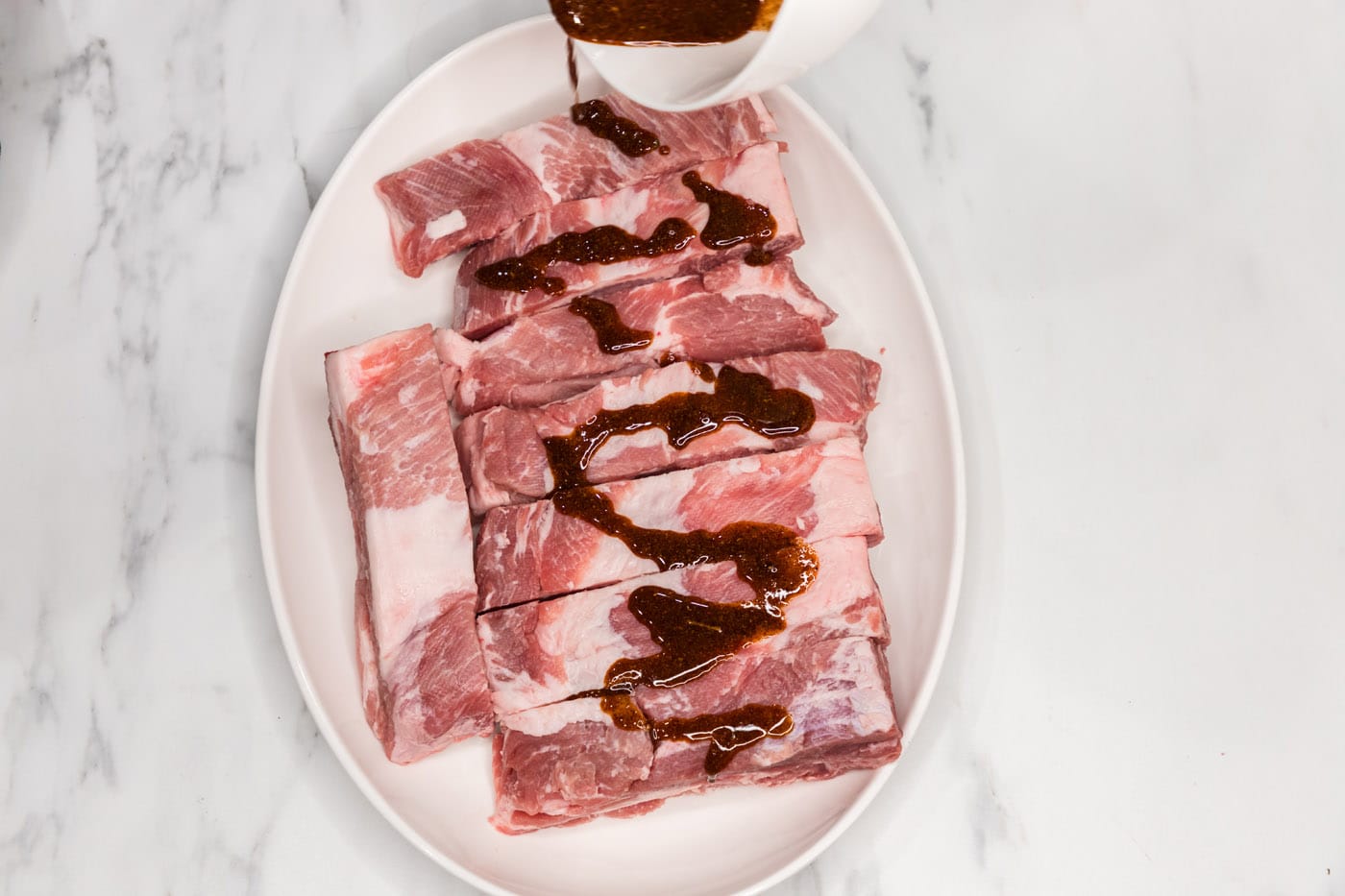 topping country style ribs with wet rub