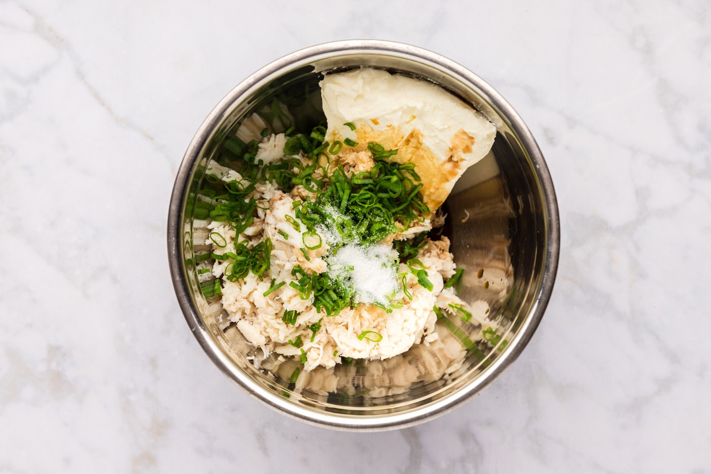 crab rangoon filling ingredients in a mixing bowl