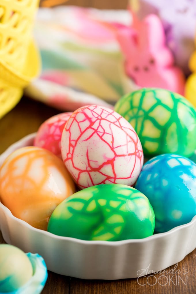 spider colored eggs in a dish