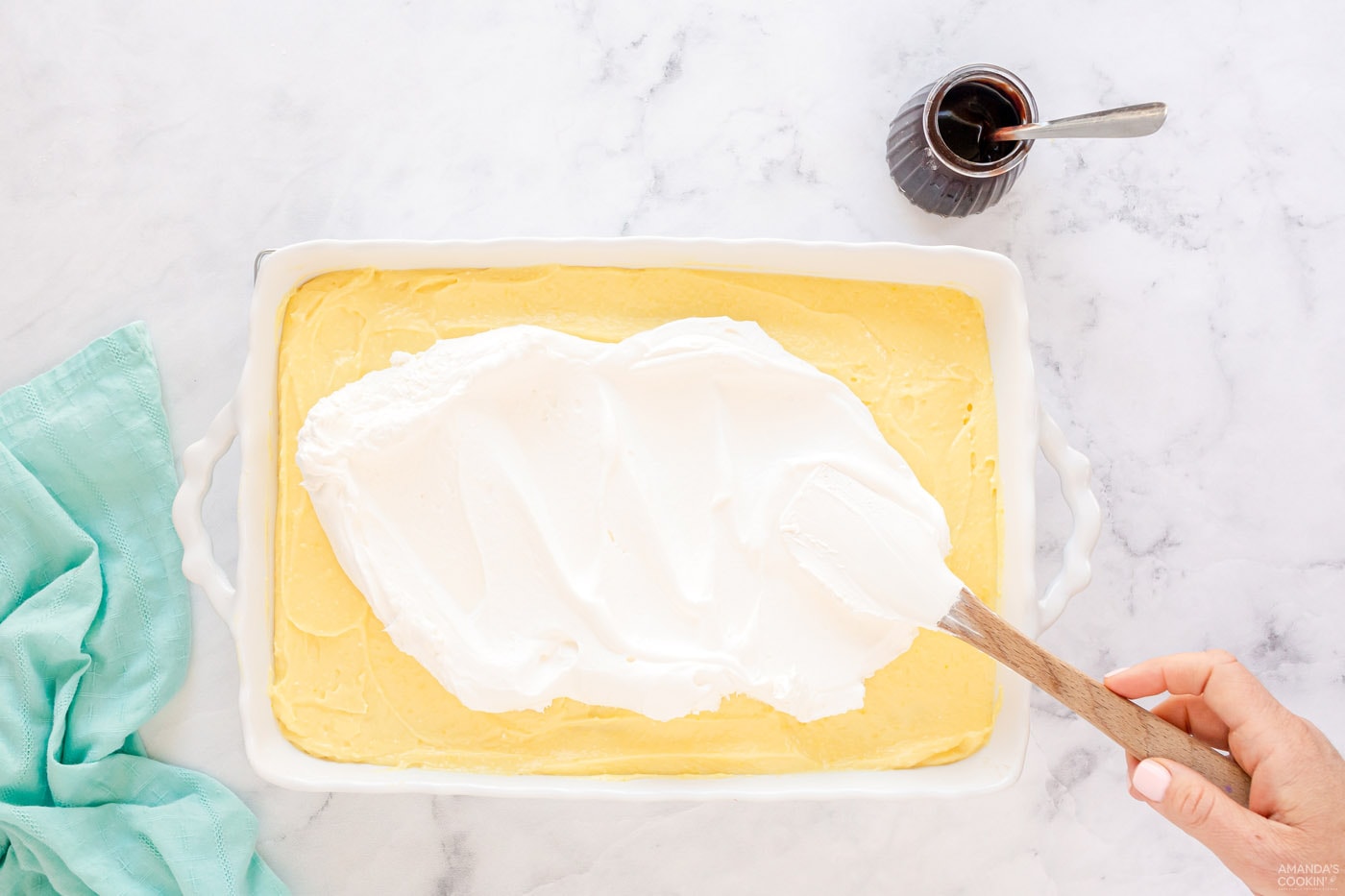 topping pudding layer with whipped topping