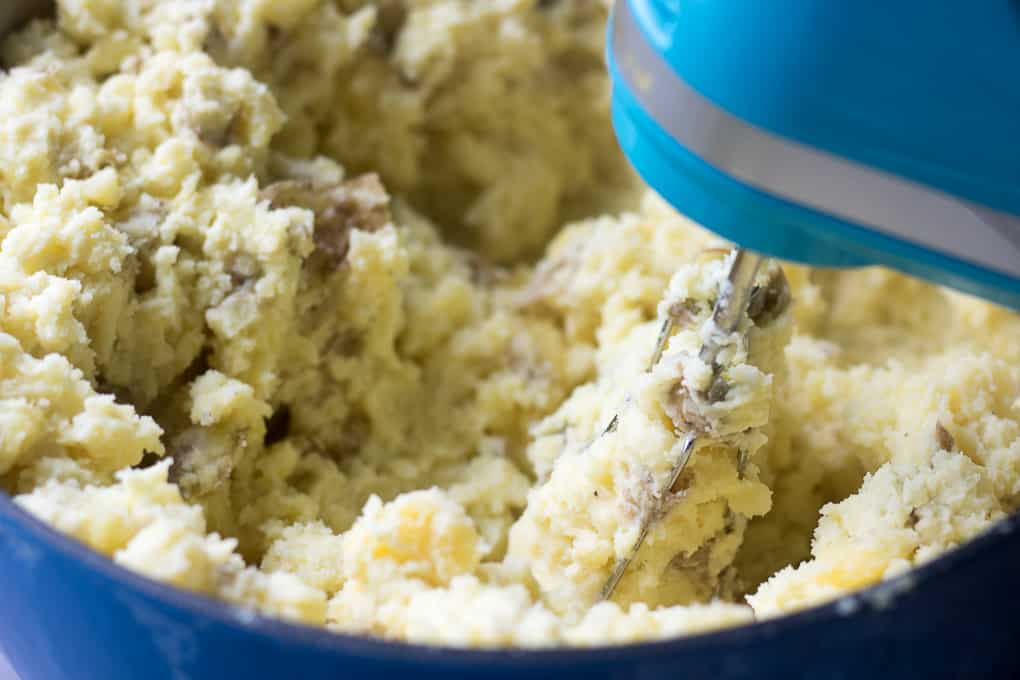 hand mixer mashing potatoes