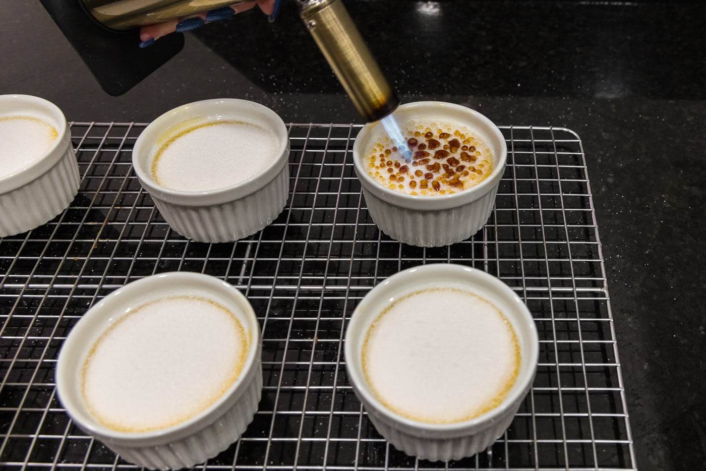 torching sugar over custard filing