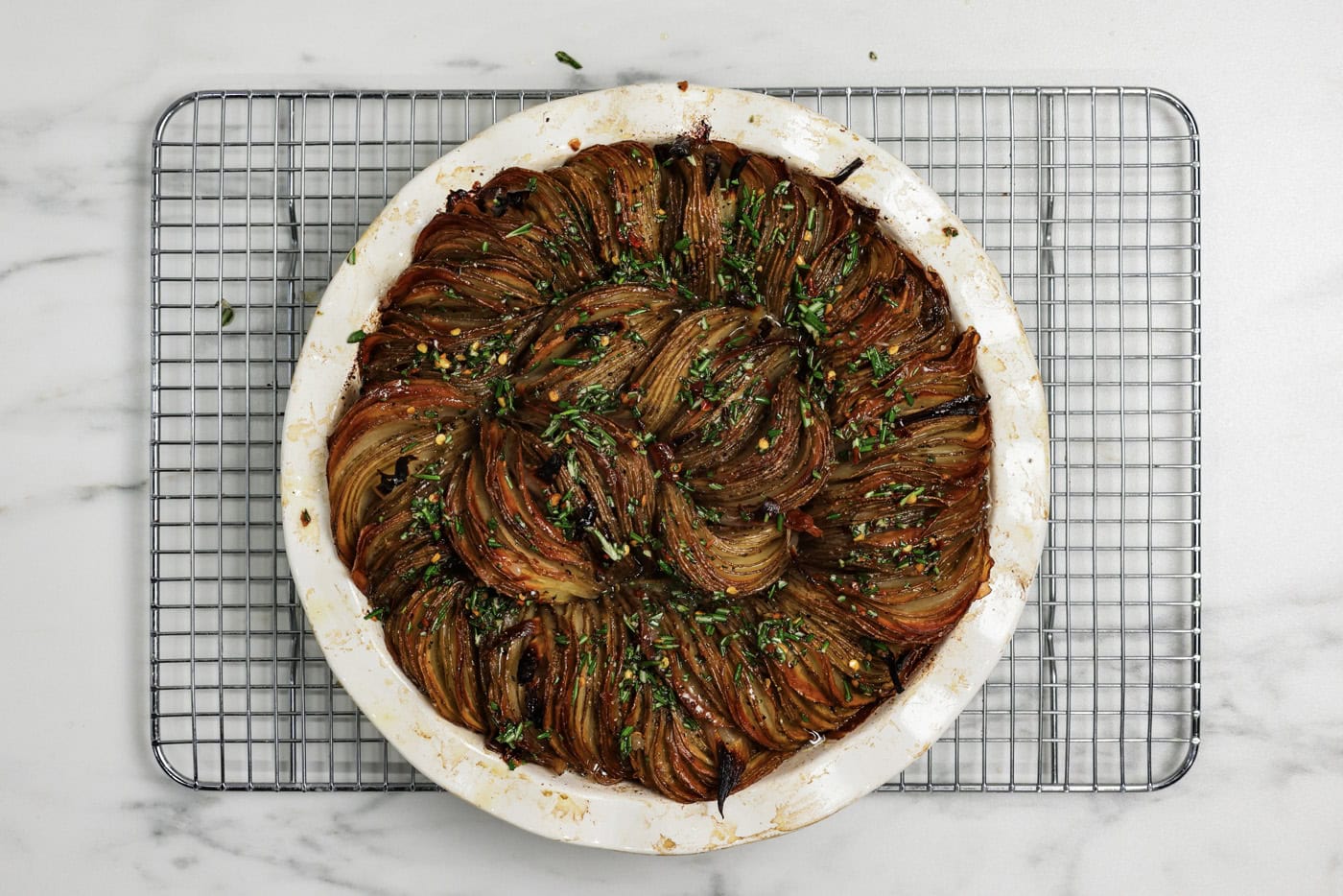 Oven roasted crispy potatoes on a wire cooling rack