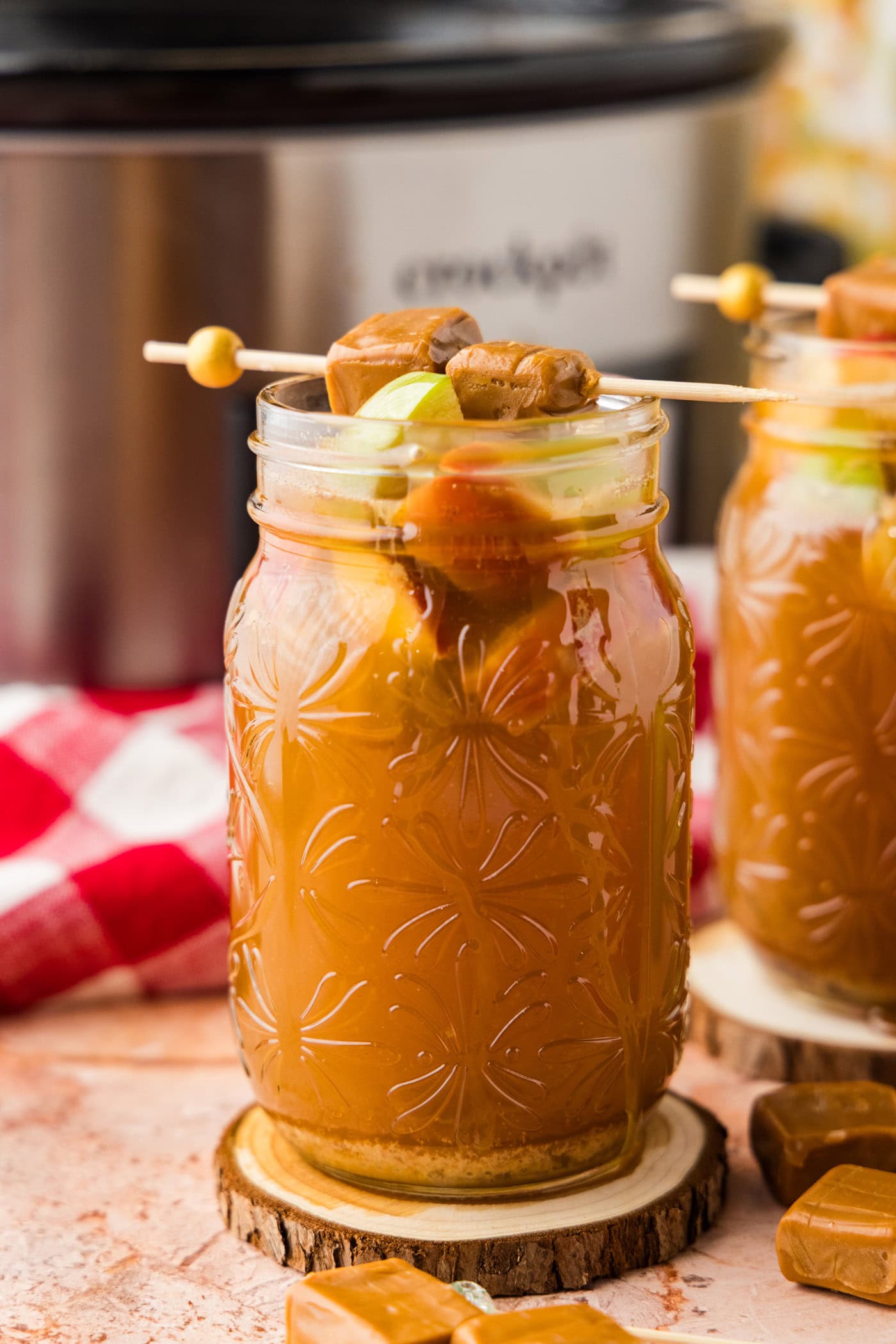 close up of Crockpot Caramel Apple Cider in a jar