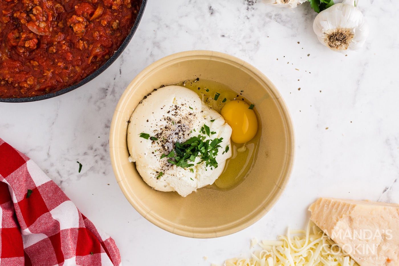 ricotta, egg and seasoning in a bowl