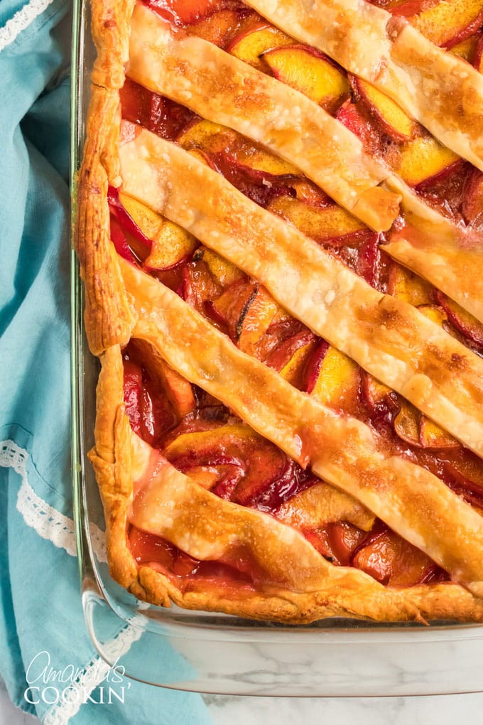 overhead close up view of deep dish peach pie