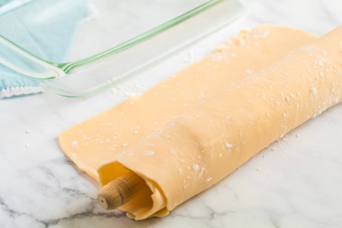 pie crust dough on rolling pin