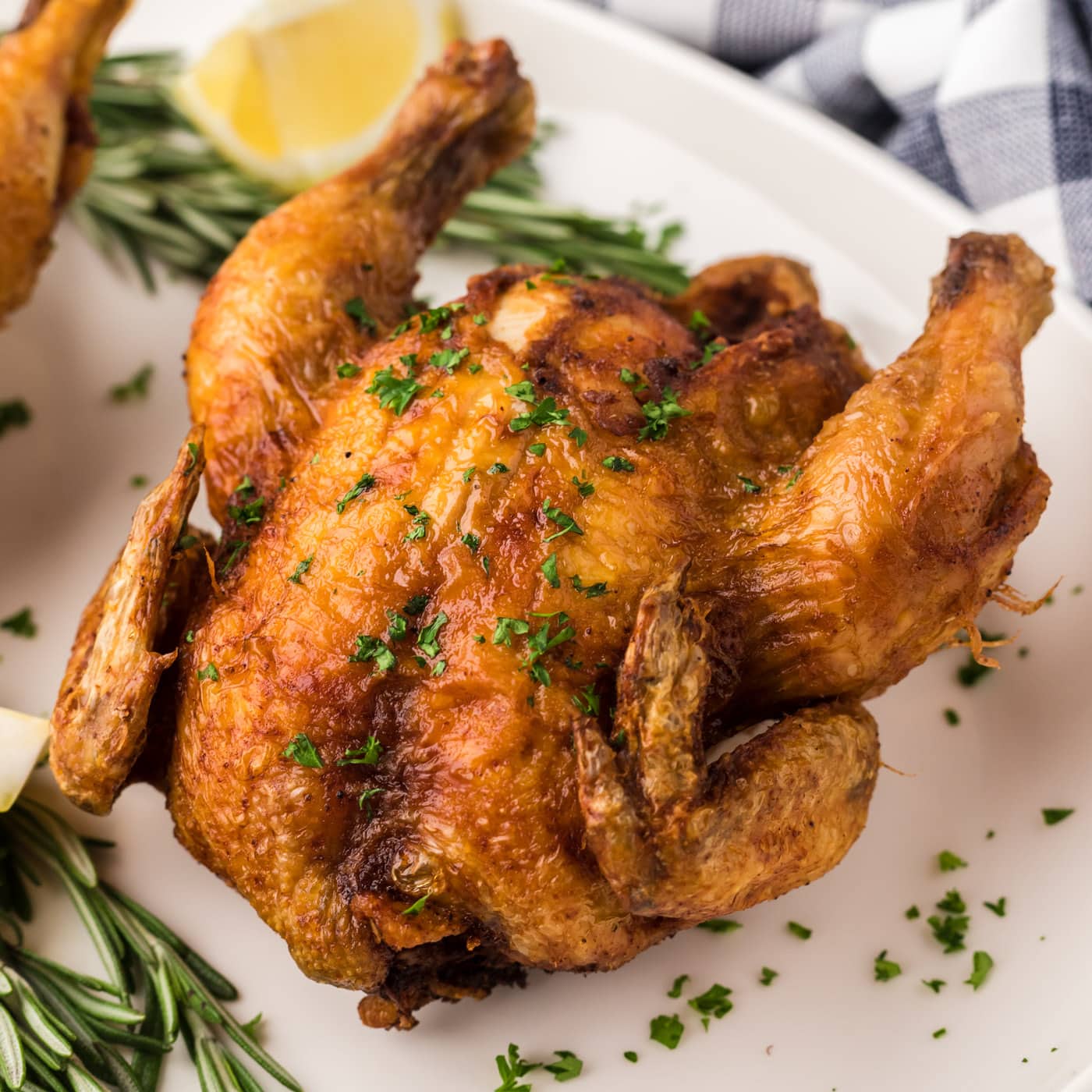 Close up photo of a Deep Fried Cornish Hen on a platter