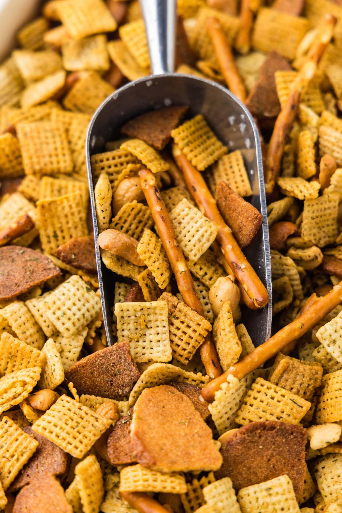 scoop in a pan of Dill Pickle Chex Mix