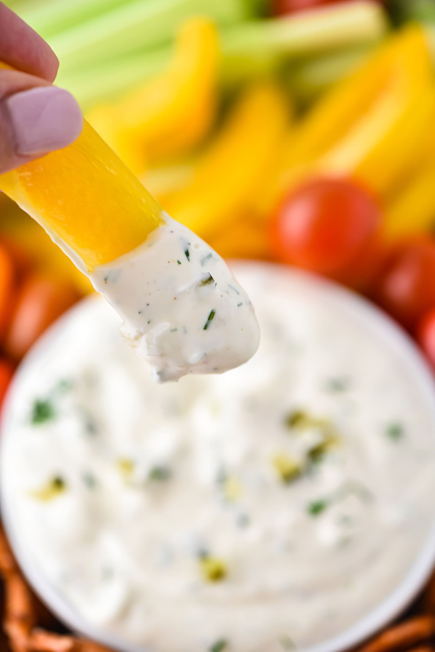 yellow bell pepper dipped in Dill Pickle Dip