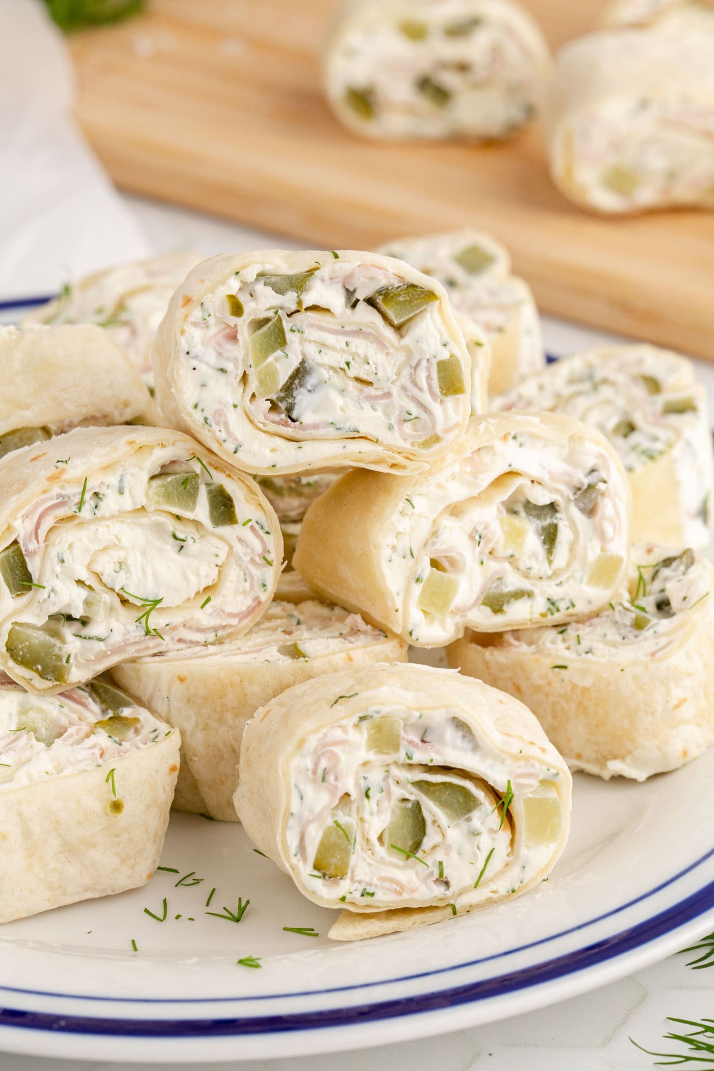Dill Pickle Pinwheels stacked on a plate