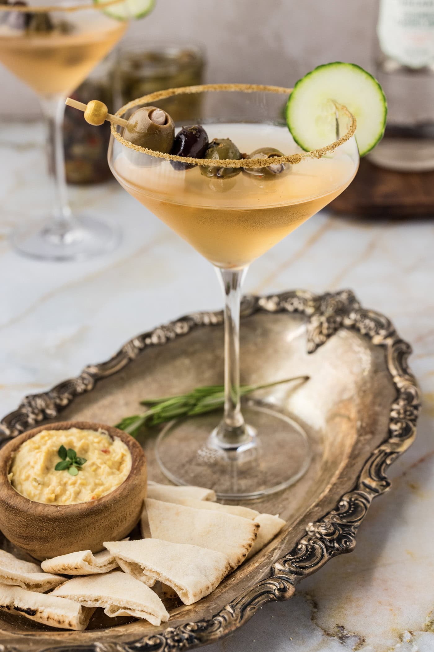 Dirty Greek Martini on a metal platter