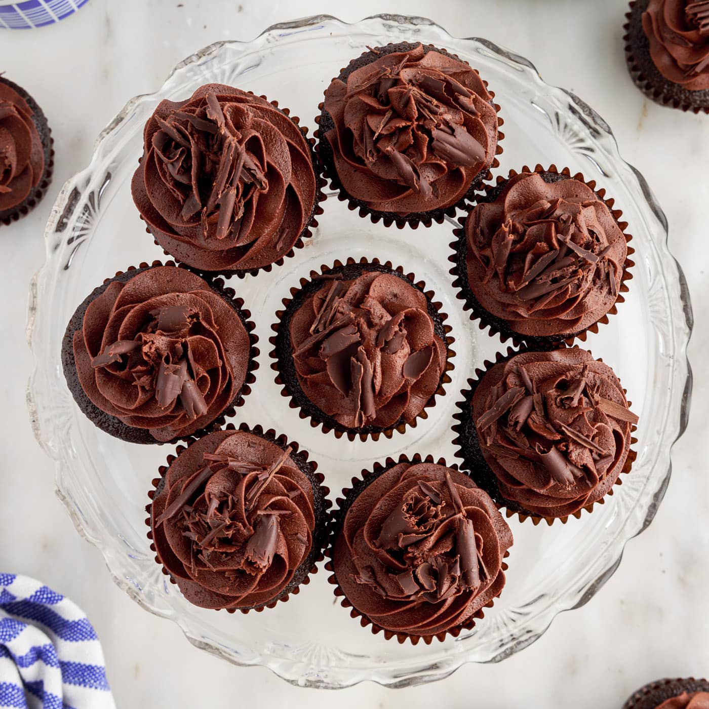 Frosted Double Chocolate Cupcakes on a cake stand