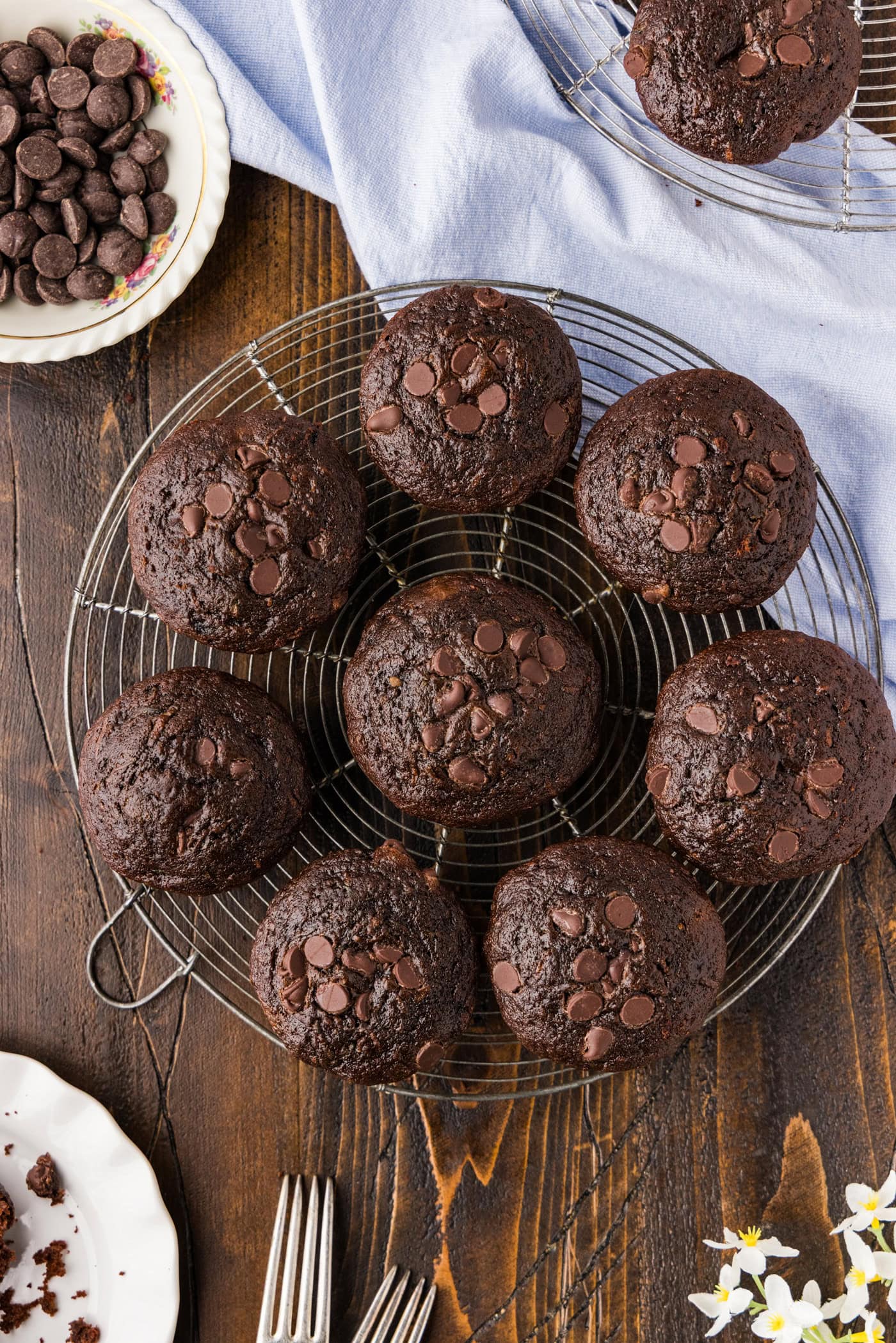 Double Chocolate Zucchini Muffins in round wire rack