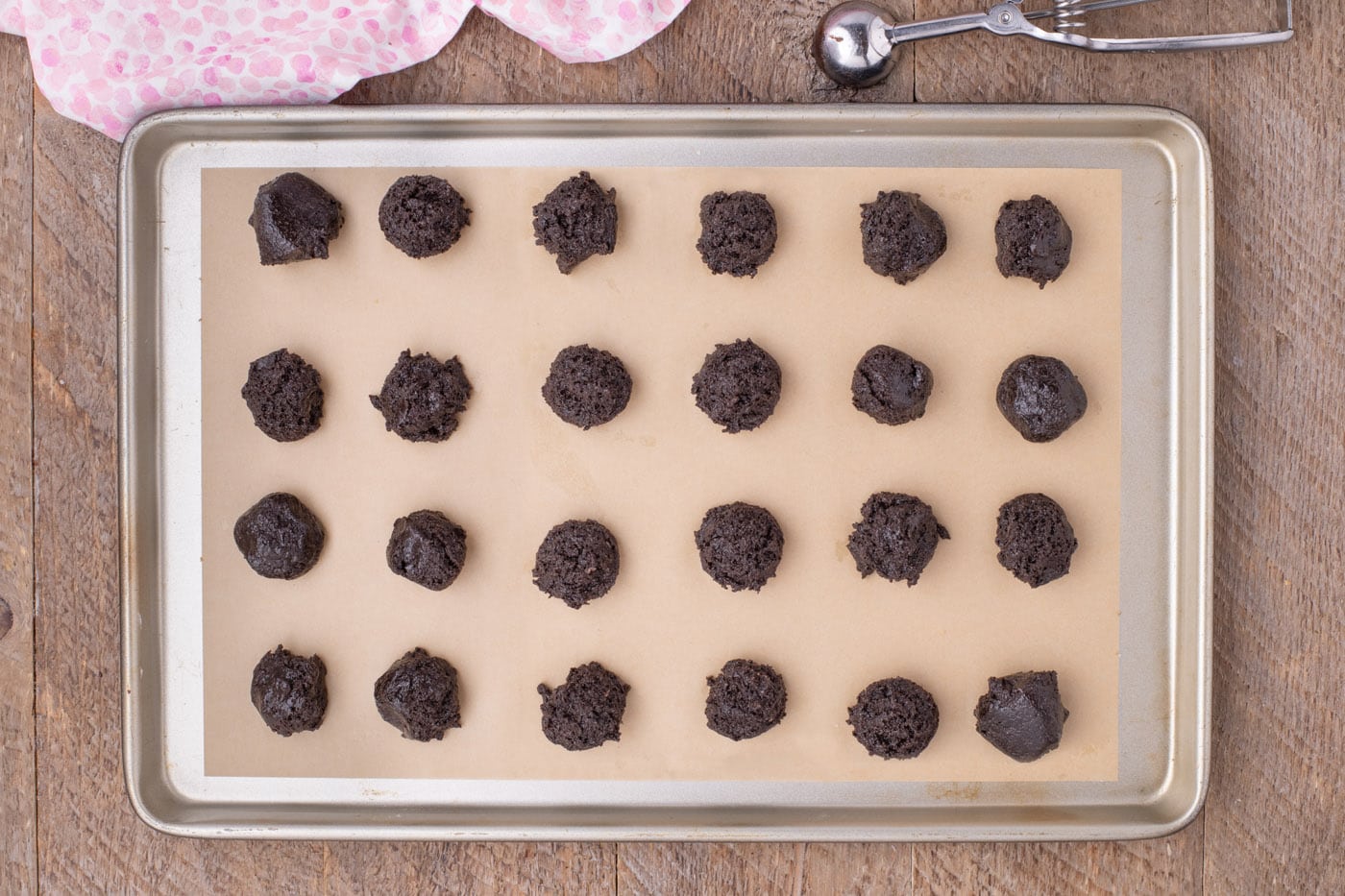 Oreo mixture scooped on a baking sheet