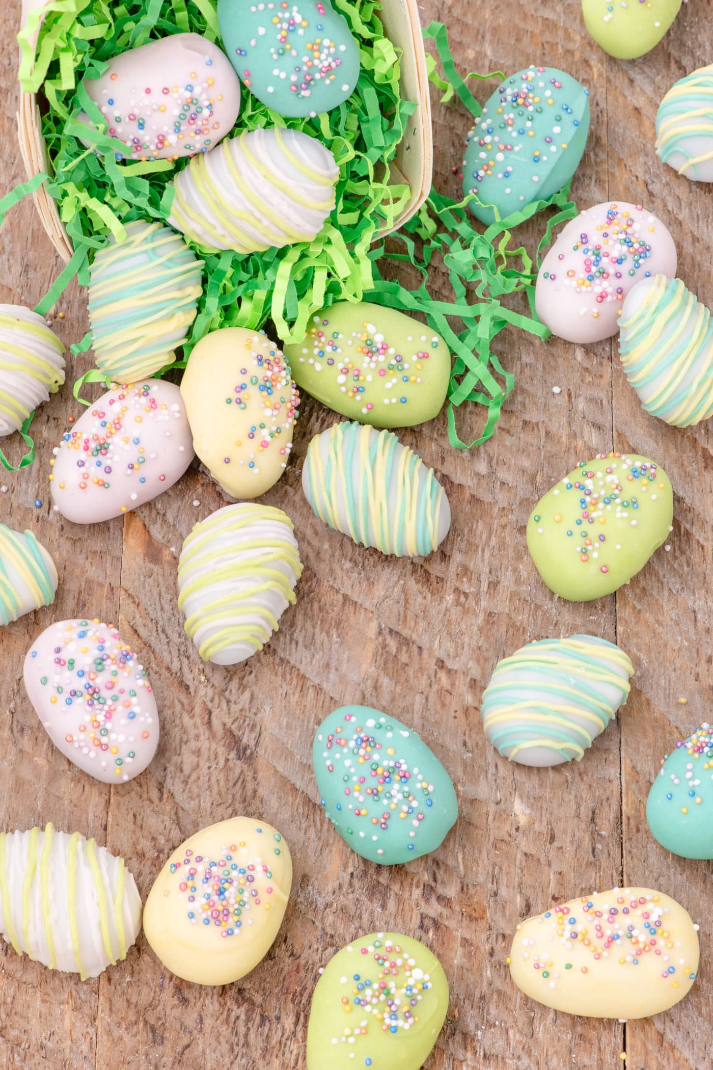 Easter Egg Oreo Truffles sprinkled out of an Easter basket