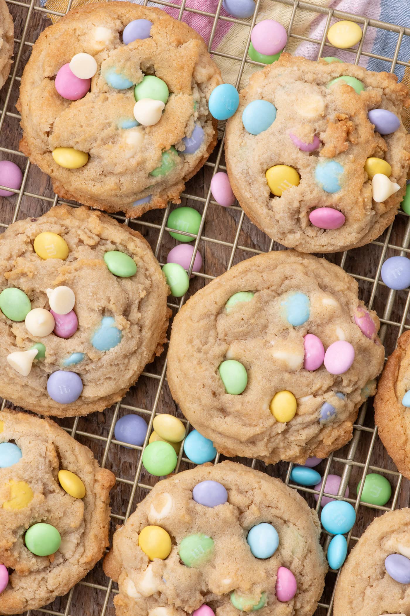 Easter M&M Cookies resting on a wire rack