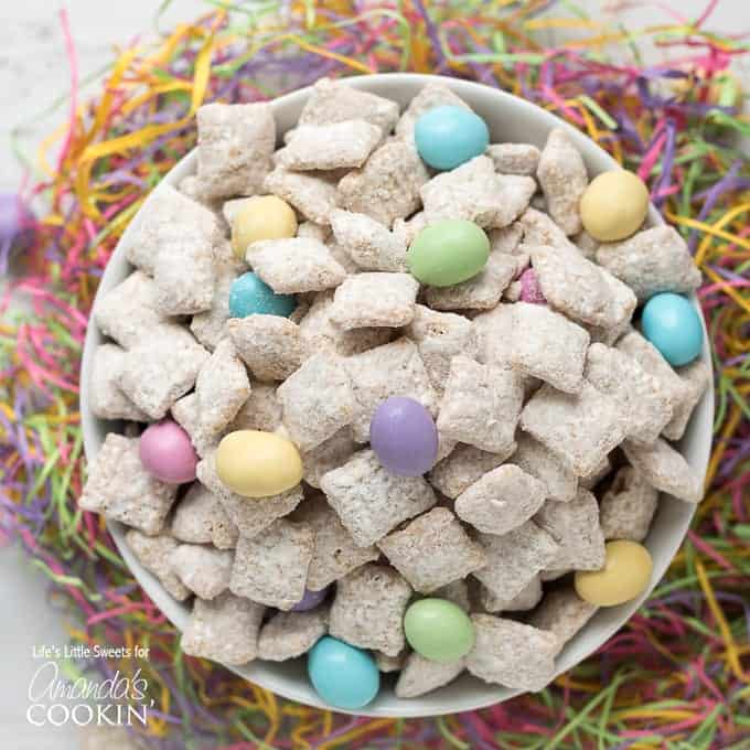 muddy buddies with easter candy in a bowl