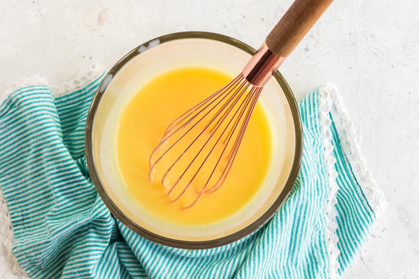 pudding in a bowl with whisk