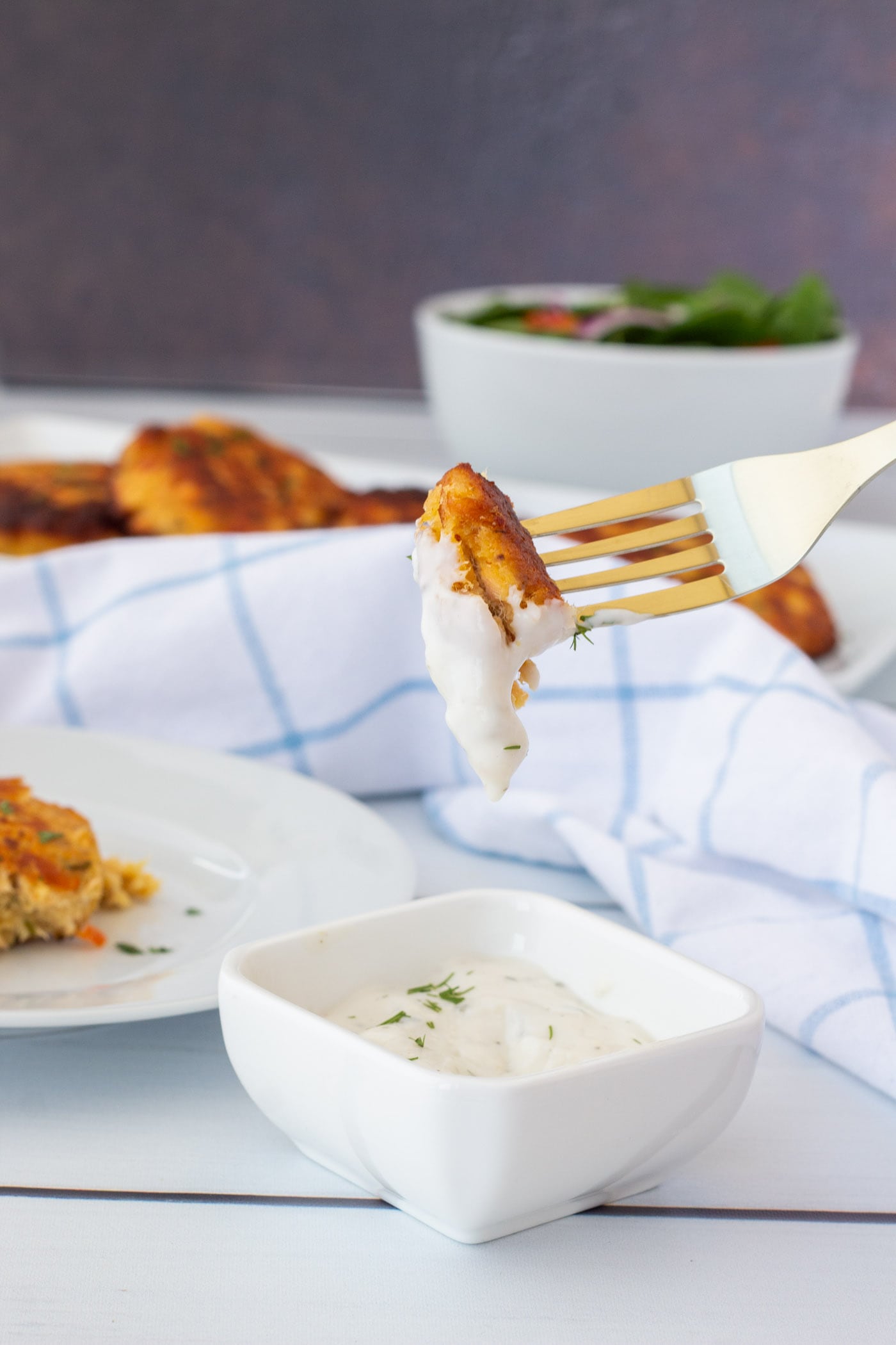 fork of Fish Cake dipped in sauce
