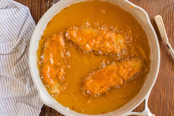 fish frying in oil