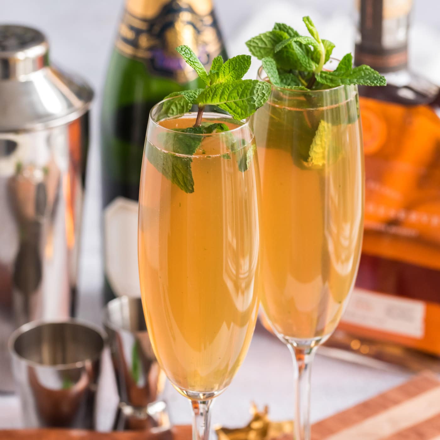 Two Fizzy Julep cocktails garnished with mint